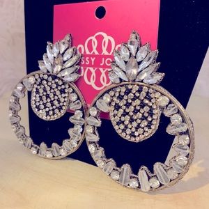 SASSY JONES VINTAGE EARRINGS. CLEAR STONES WITH SILVER AND BLACK UNDERTONES.